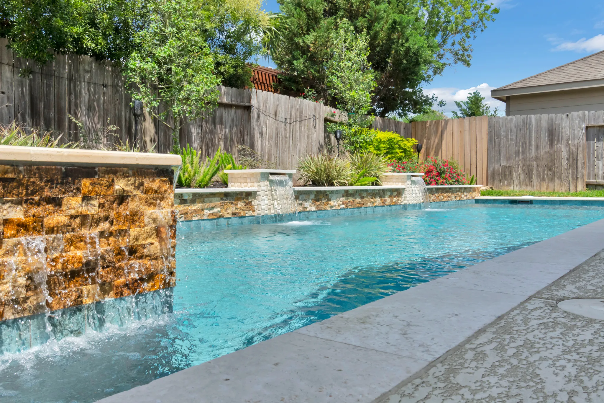 Backyard swimming pool and spa